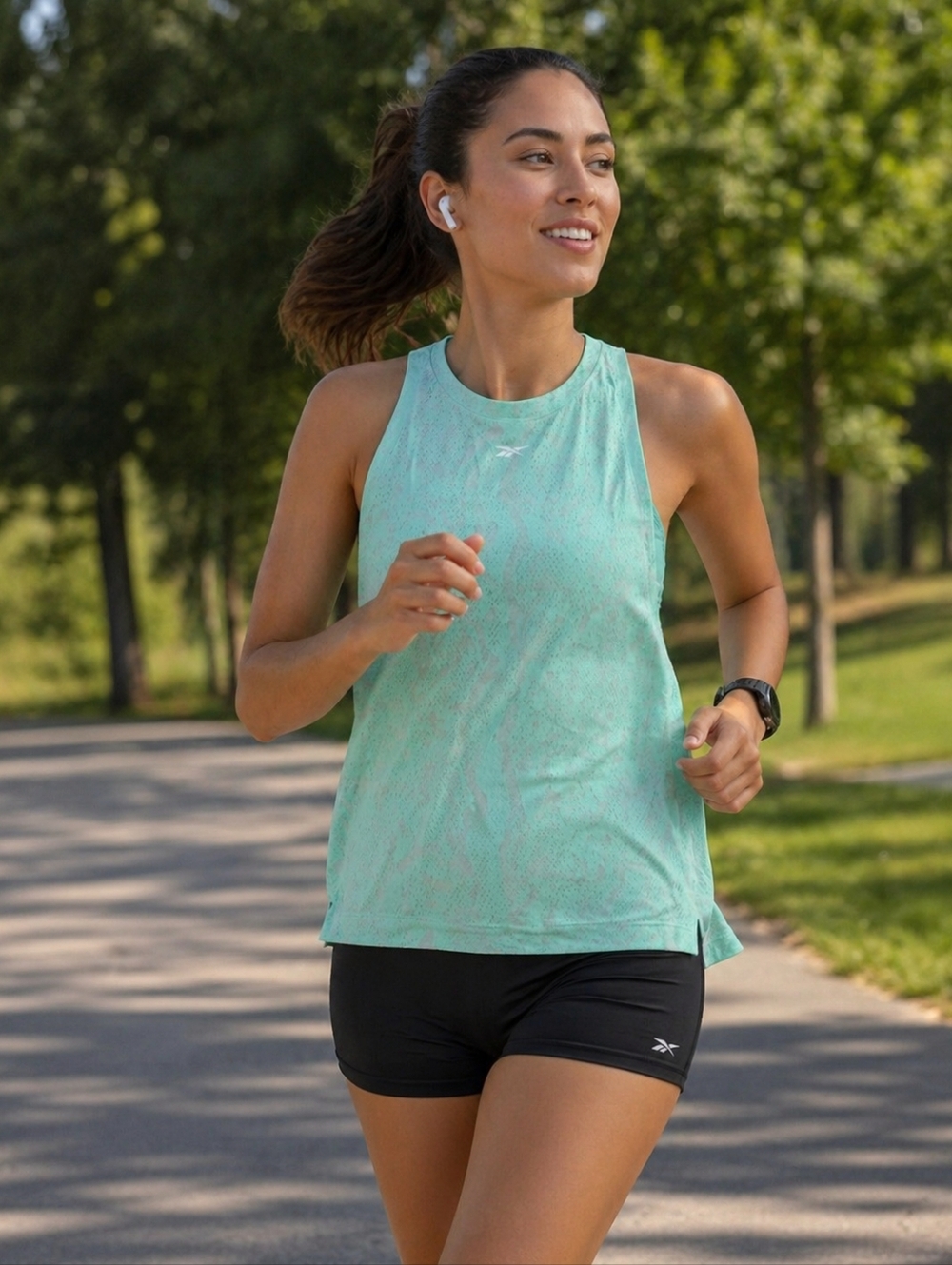 Reebok Women's Sleeveless Light Green Muscle Tee